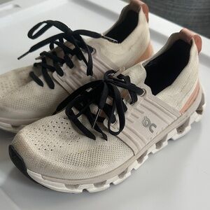 On Running Beige and Black Athletic Shoes